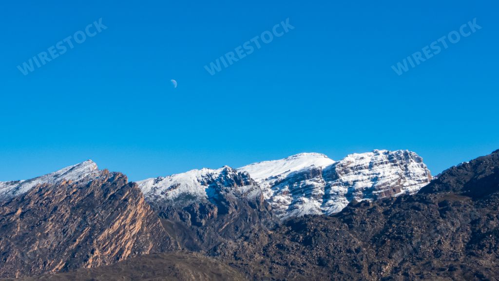A scenic view of snow-capped mountains in the Breede Valley area, South Africa