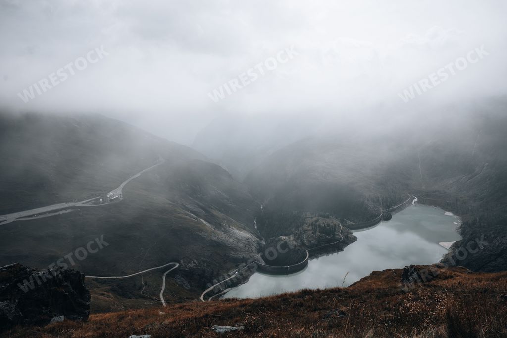 The floating clouds over the mountains in Austria near Grossglockner High Alpine Road