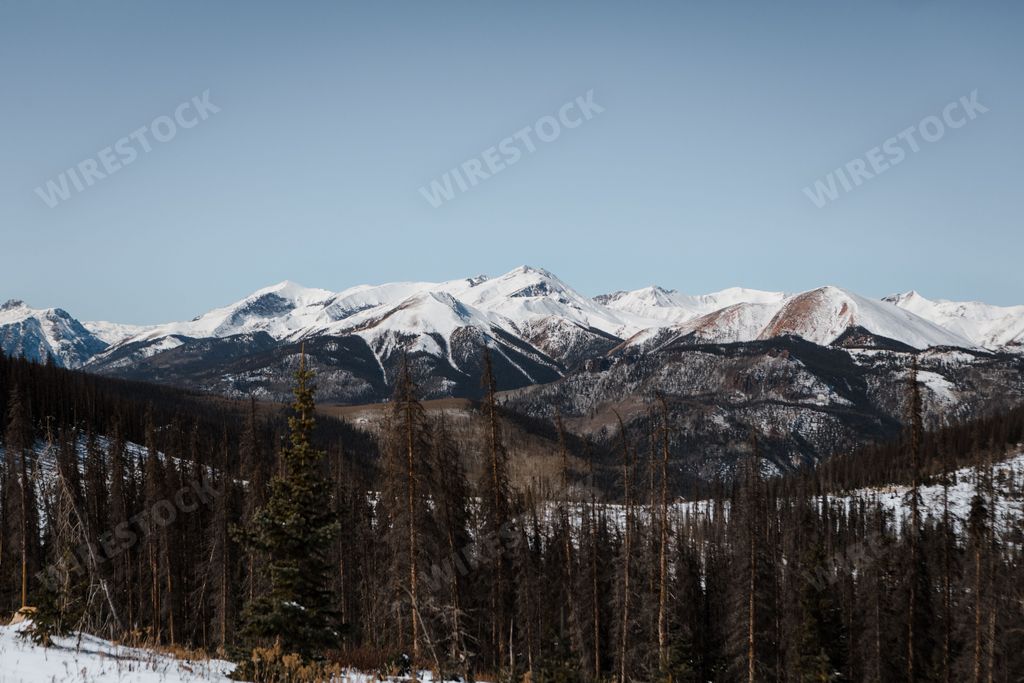 A beautiful landscape of snowy mountains in Colorado