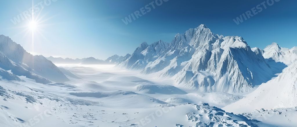 High mountains covered with snow at sunrise