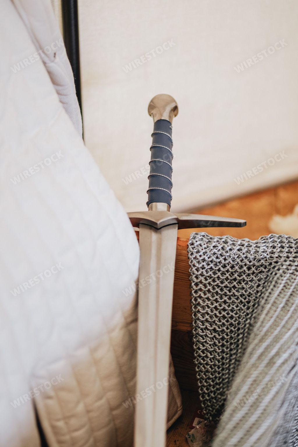 A vertical closeup shot of a historic silver sword