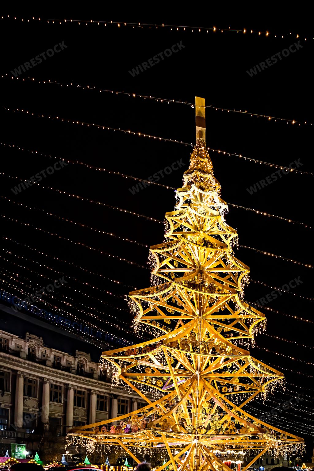 A vertical shot of the Christmas tree at Universitate square in Bucharest, Romania