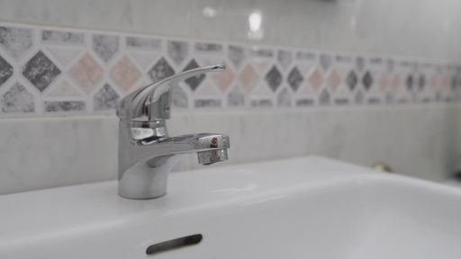 Hand turning on and off the tap for running water in HD Stock video ...