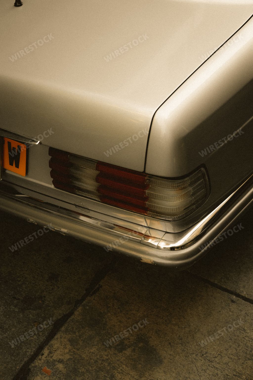 A vertical closeup of Mercedes Benz classic car
