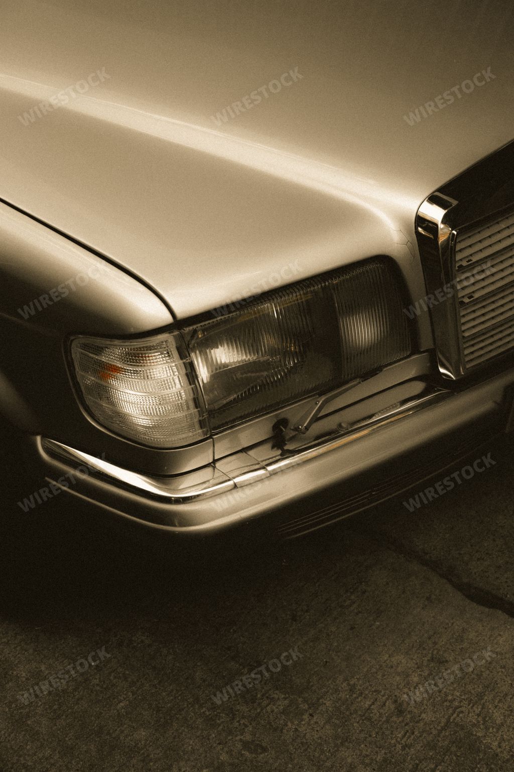A vertical closeup of Mercedes Benz classic car