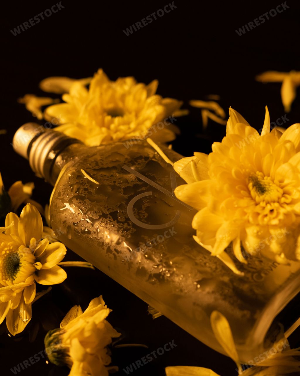 A vertical shot of Calvin Klein Cologne for men product designed with yellow flowers