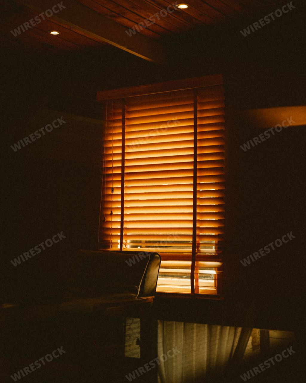A closeup of a light shining through window