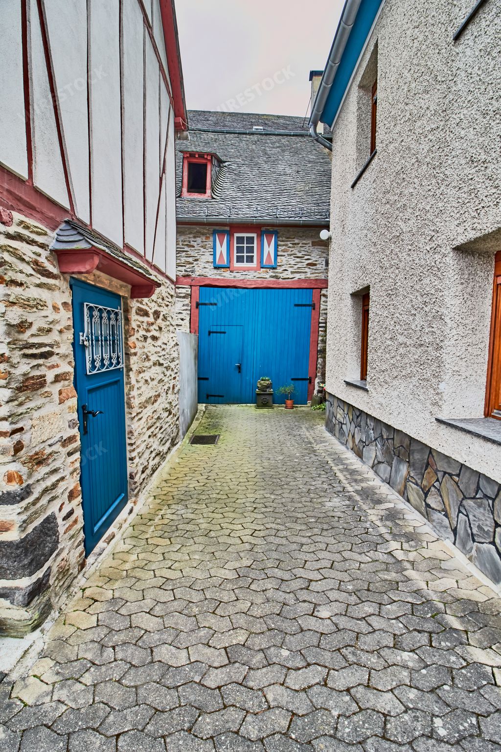 A beautiful shot of a stone floor street with old houses in the old village Monreal buildings, Germany