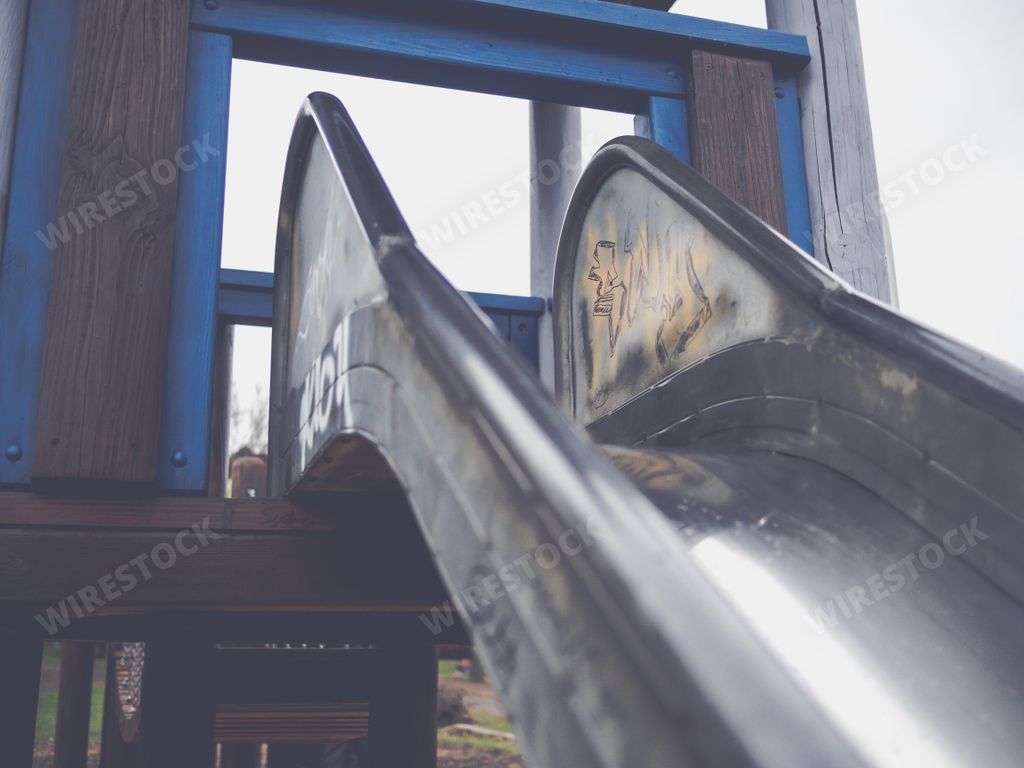 A wide angle shot of a slide for children in the playground
