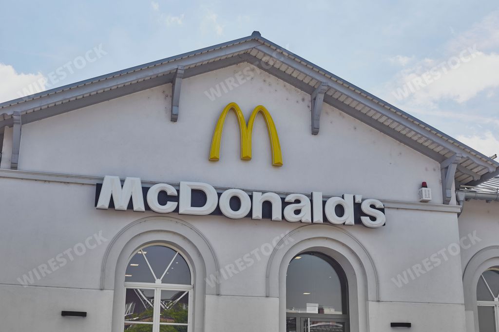 An Entrance of a McDonald's restaurant white building