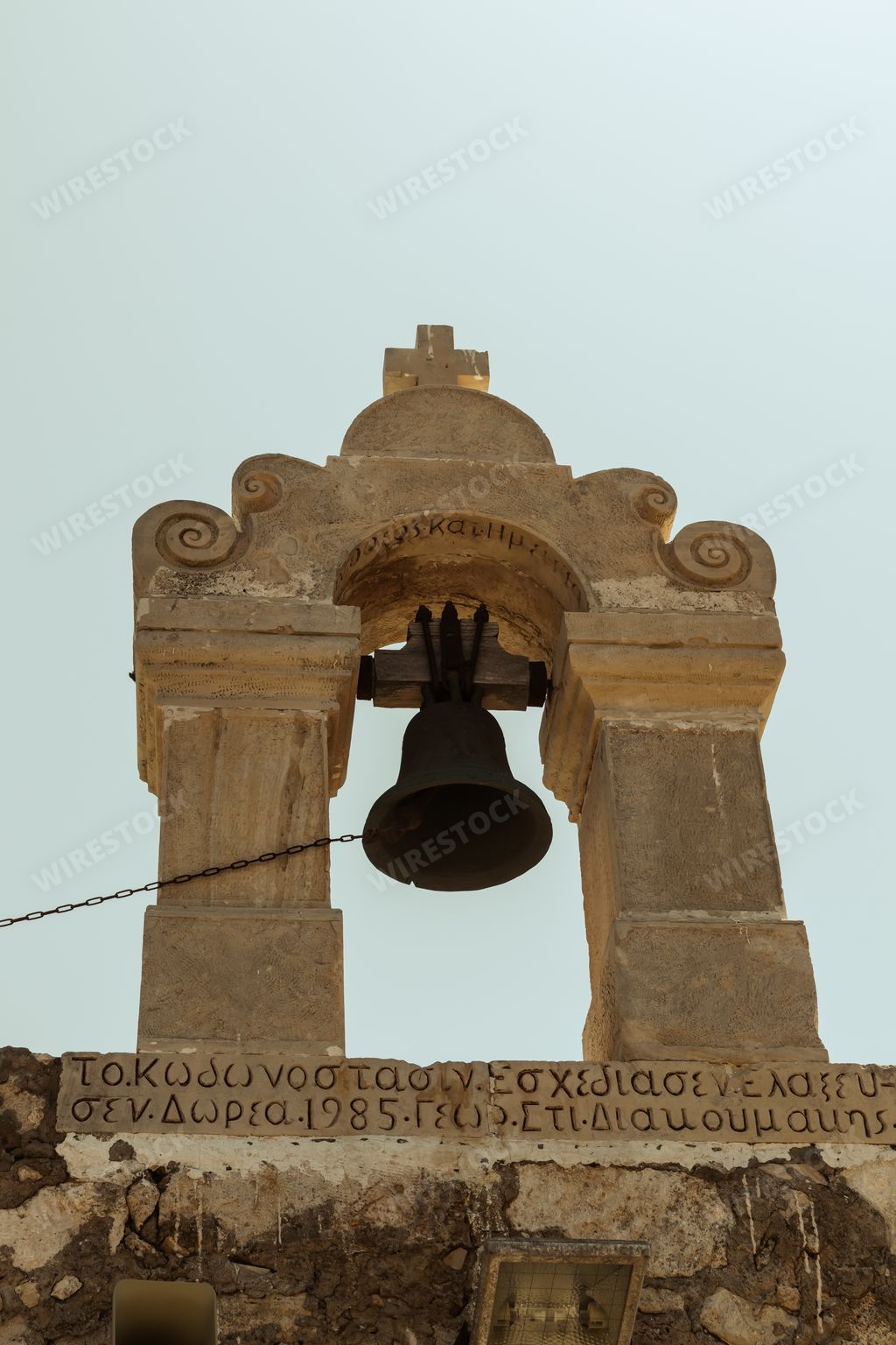 A low angle shot of a belfry in Venetian Fortezza Castle in Rethymno, Crete, Greece