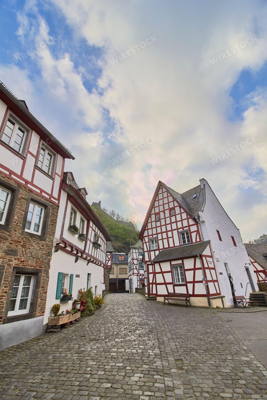 A vertical shot of houses in a little town Monreal in Eifel, Germany