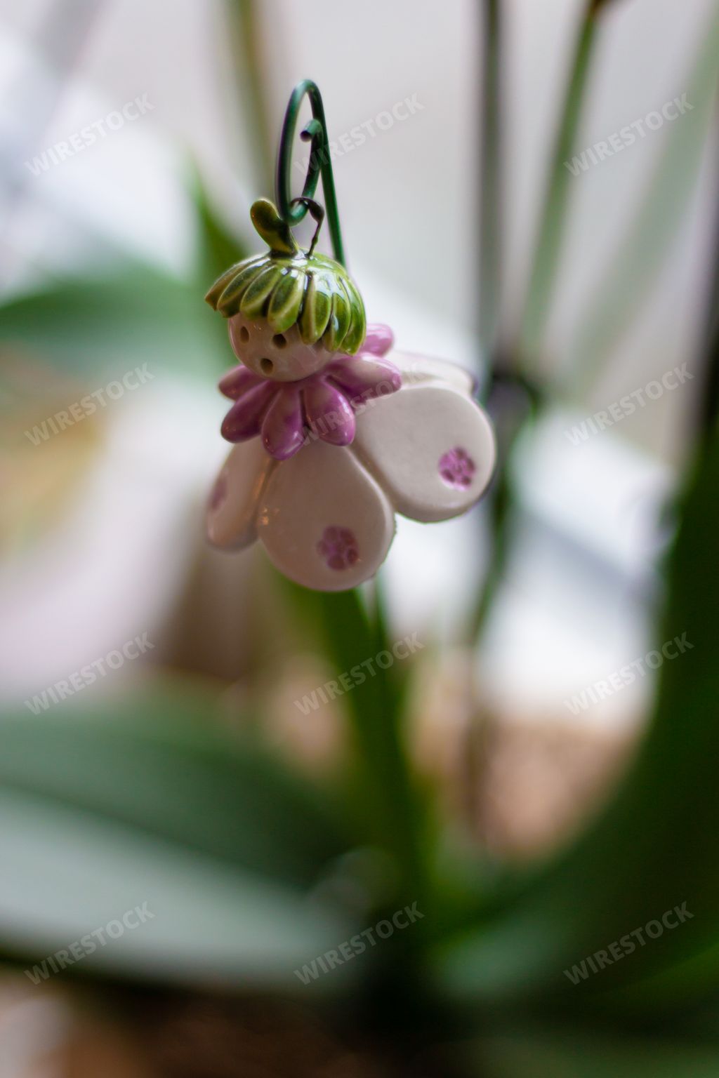 A closeup shot of a cute toy decoration with a blurred background