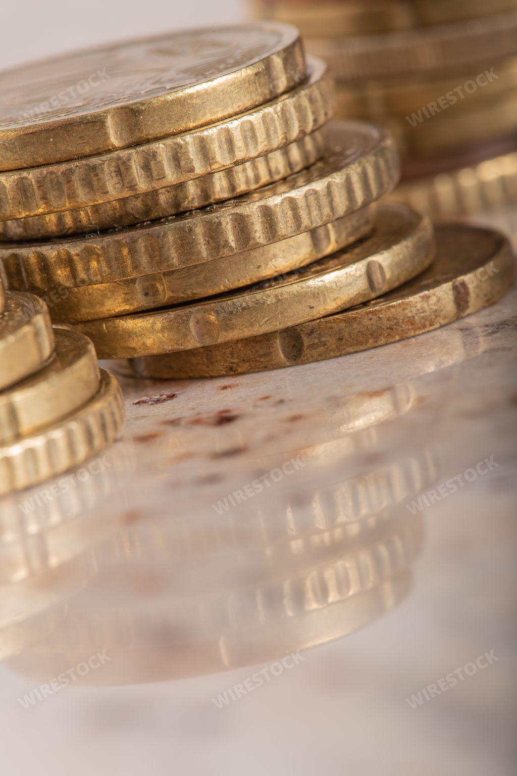 The gold coins cash money in piles, Isolated on white background