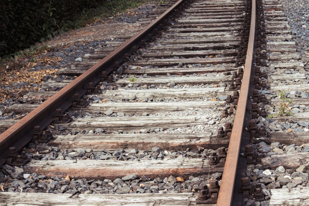 A closeup shot of wooden train tracks