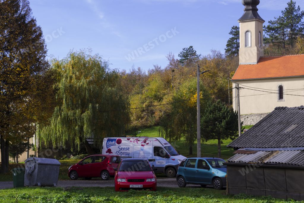 City of Gracac, Croatia in autumn, a view of the street, the church and the nature that surrounds them