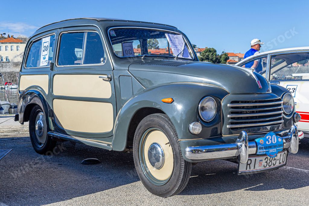 A closeup of a Fiat 500 Belvedere Topolino, a classical Italian oldtimer car from 1950's