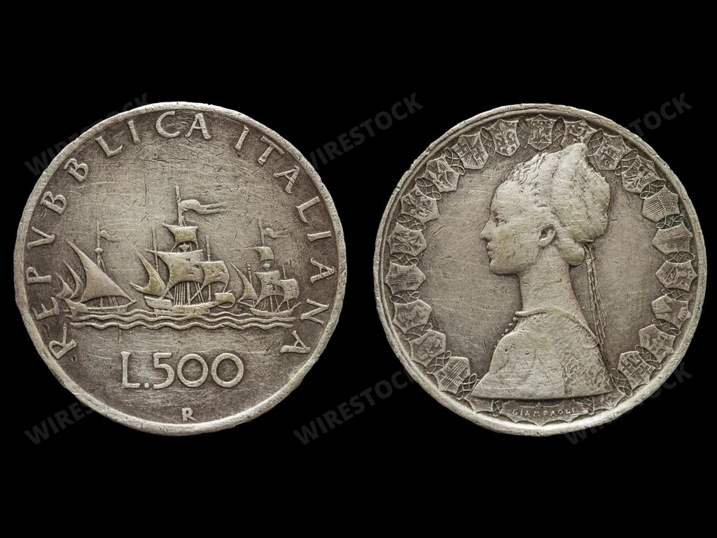 The Old Italian lira coin obverse and reverse on isolated black background