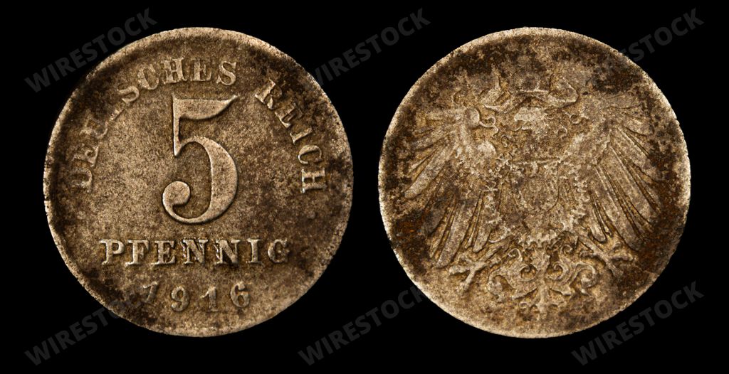A close-up photo of an old German mark, five pfennig coin from 1916