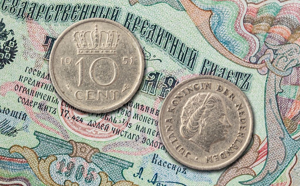 A macro image of a Netherlands 10 cent coin, closeup shot, with the details of the coin visible