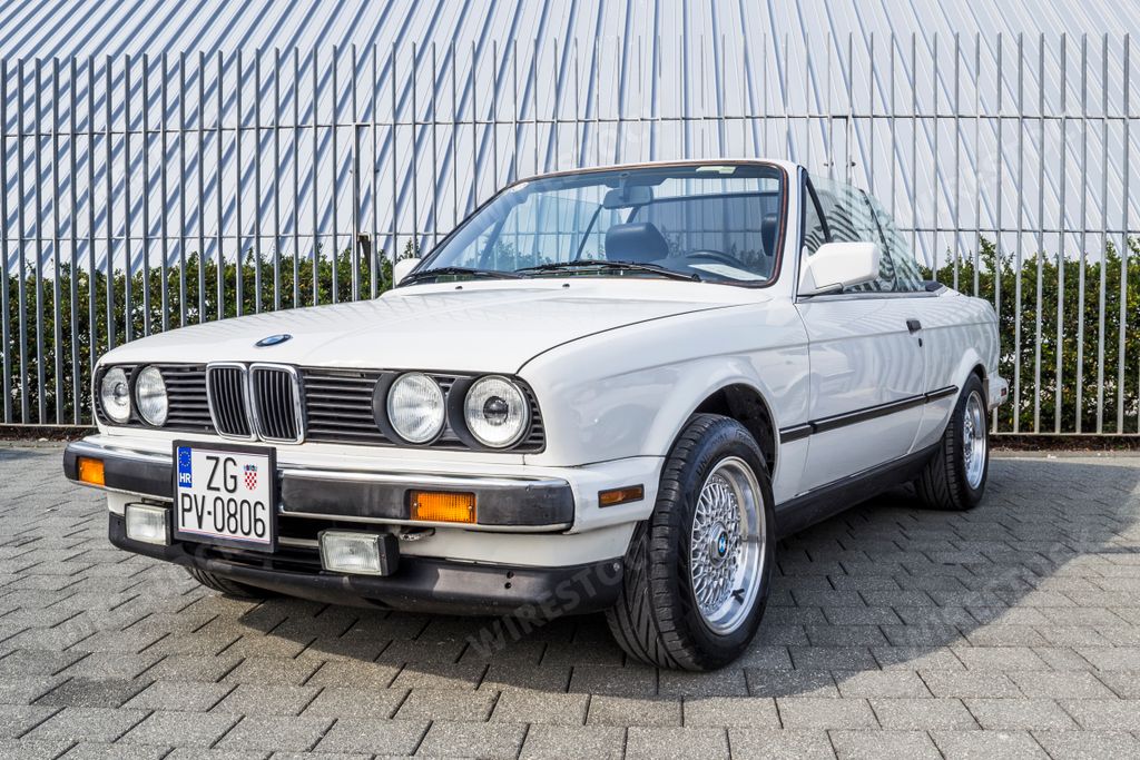 A vintage oldtimer BMW E21 cabriolet on classic car exhibition.