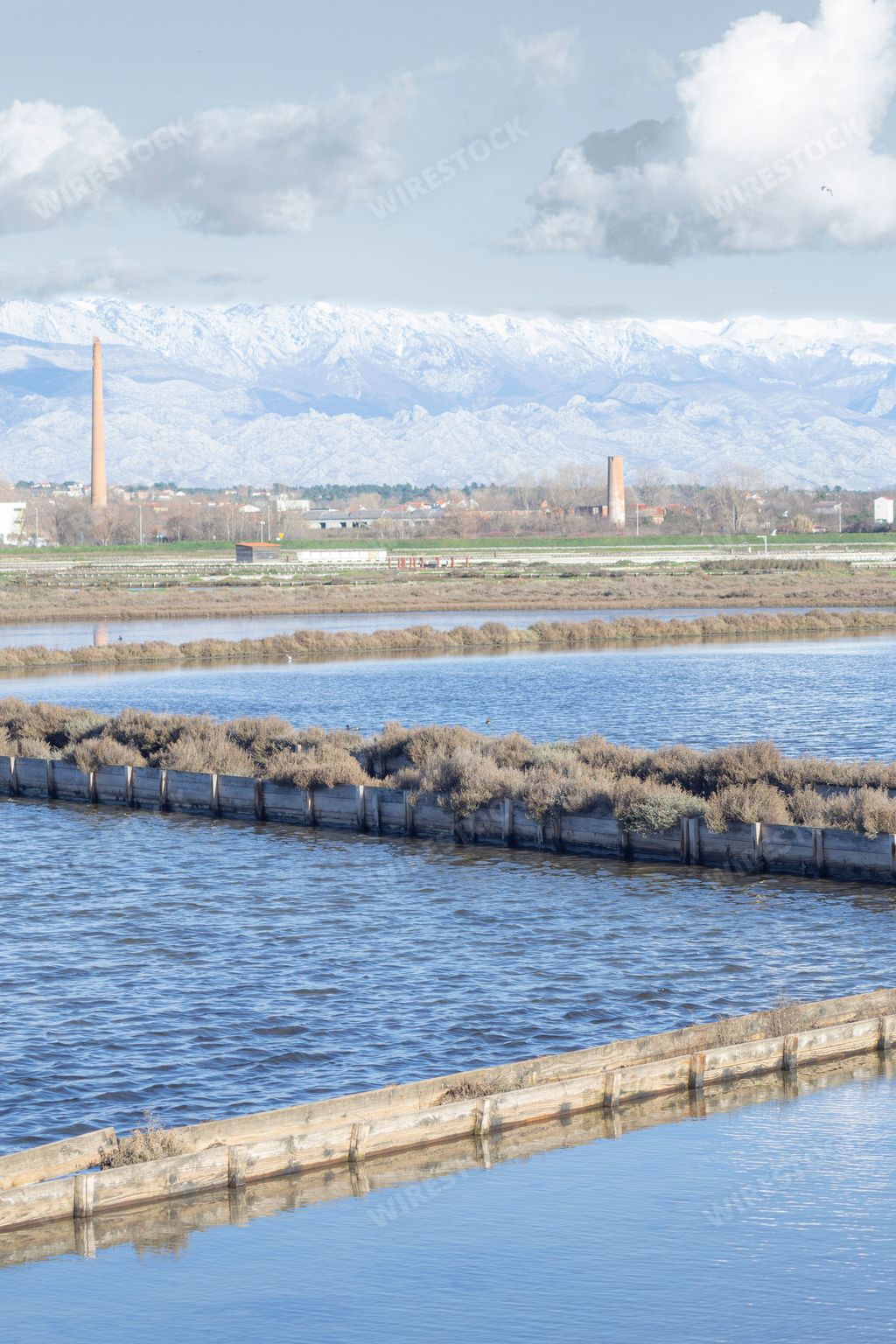 A vertical shot of saltworks with evaporation ponds for natural production of salt, Nin, Croatia