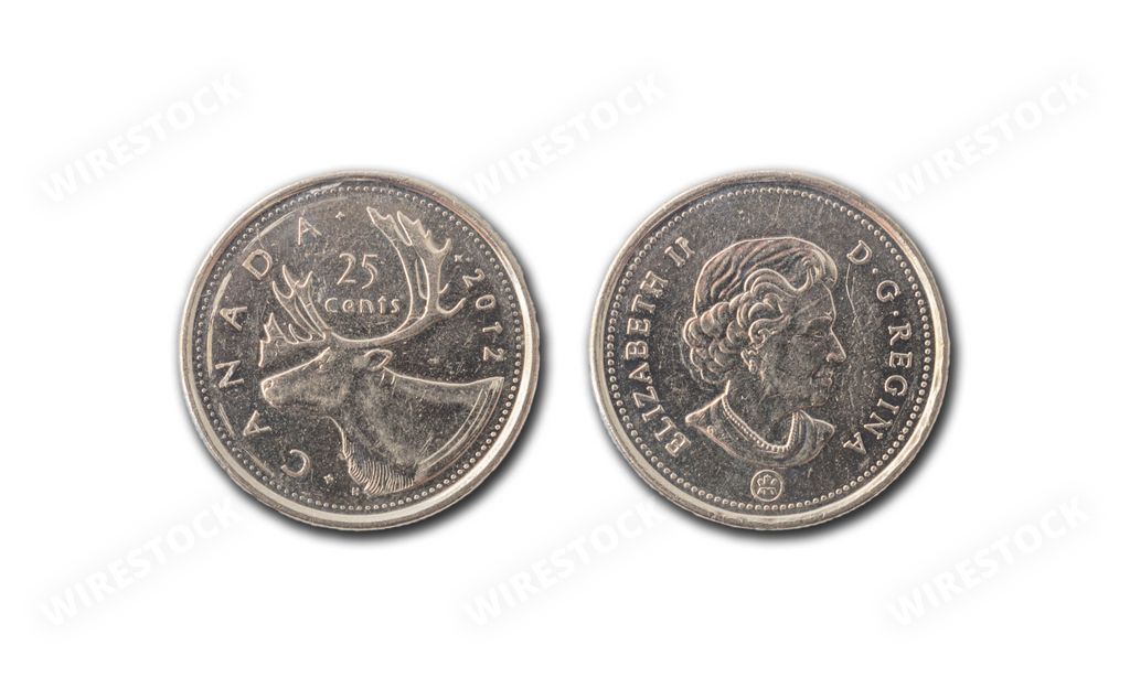 A closeup shot of Canadian cent coins featuring the portrait of Her Majesty Queen Elizabeth II