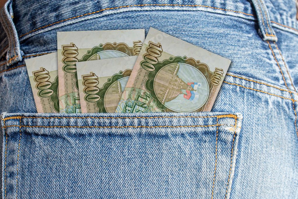 The Russian money currency, rubles in a jeans' back pocket