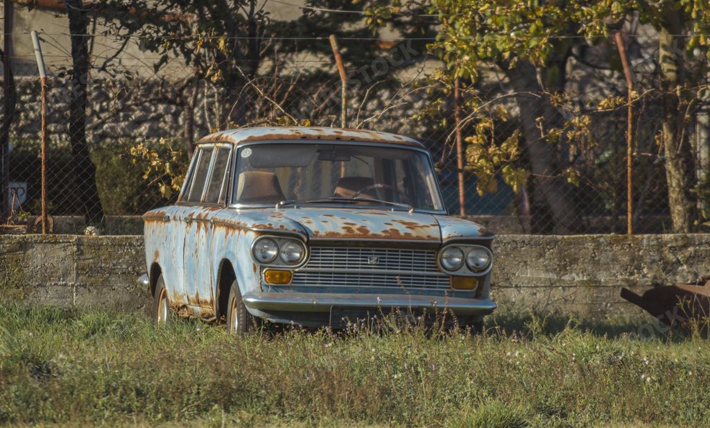 Old rusty zastava 1300, is a vintage yugoslavian car from 1970's made under Fiat licence