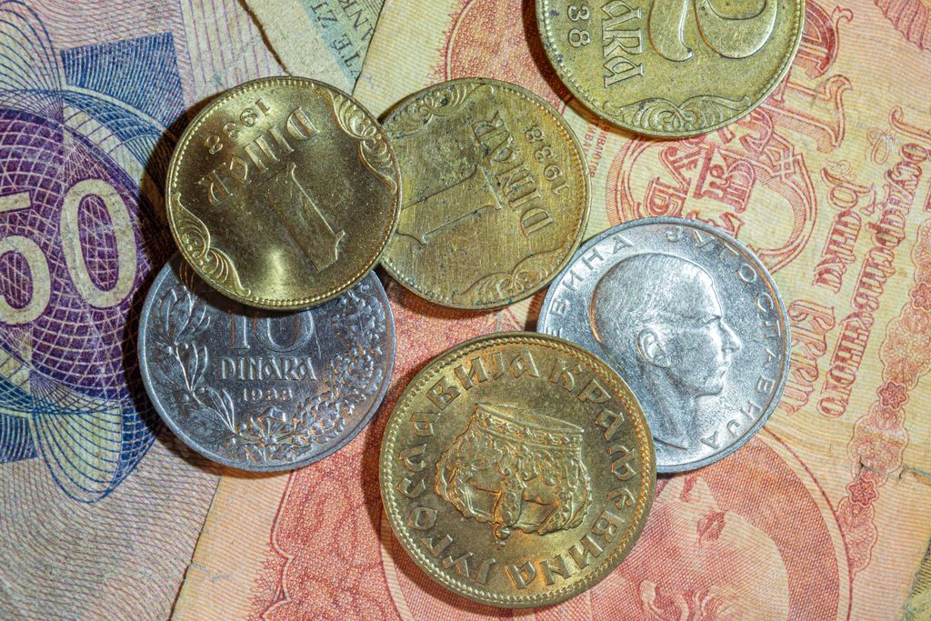 A closeup of the Kingdom of Yugoslavia currency coins