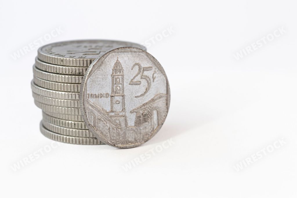 A closeup of Cuban coins on a white background