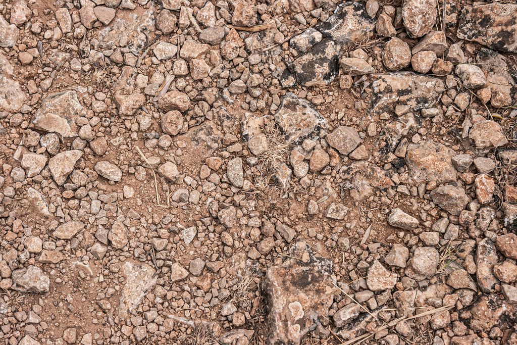 Dirt road, gravel backgound, texture, stones, pebbles and dirt