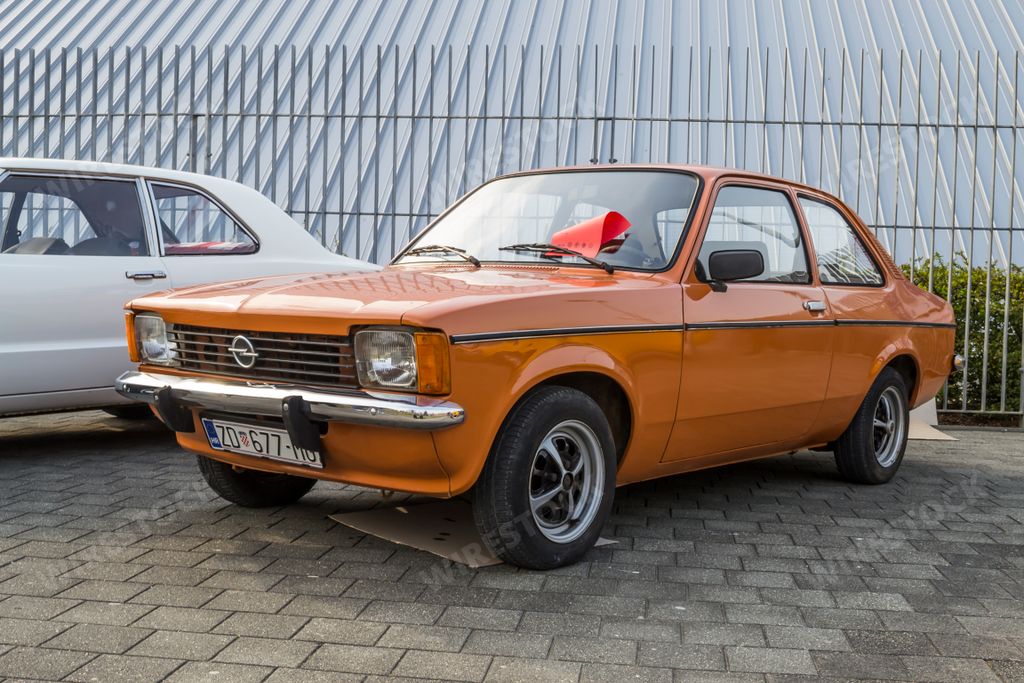 A closeup of an Opel kadett c coupe old timer displayed at classical car exhibition