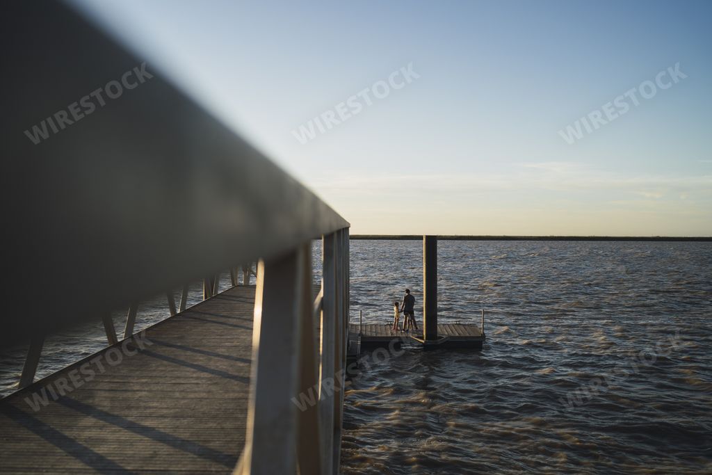 A mesmerizing view of a pier leading to Guadalquivir river in Trebujena, Cadiz, Spain