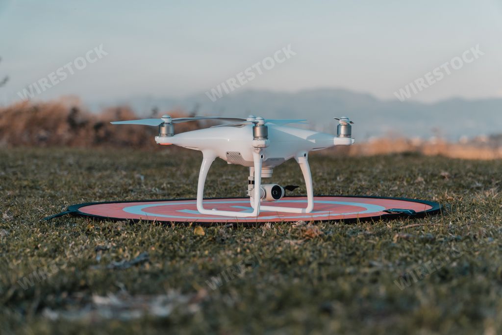 A big white drone on the ground