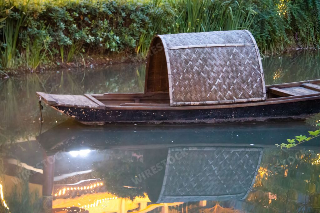 A closeup of a traditional fishing boat in the river. Meishan, Sichuan, China.