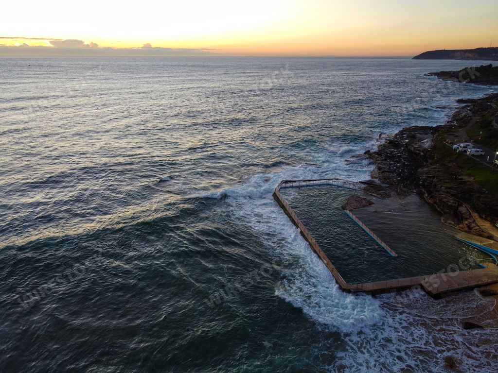 A beautiful sunset view from the top of cliffs in the sea