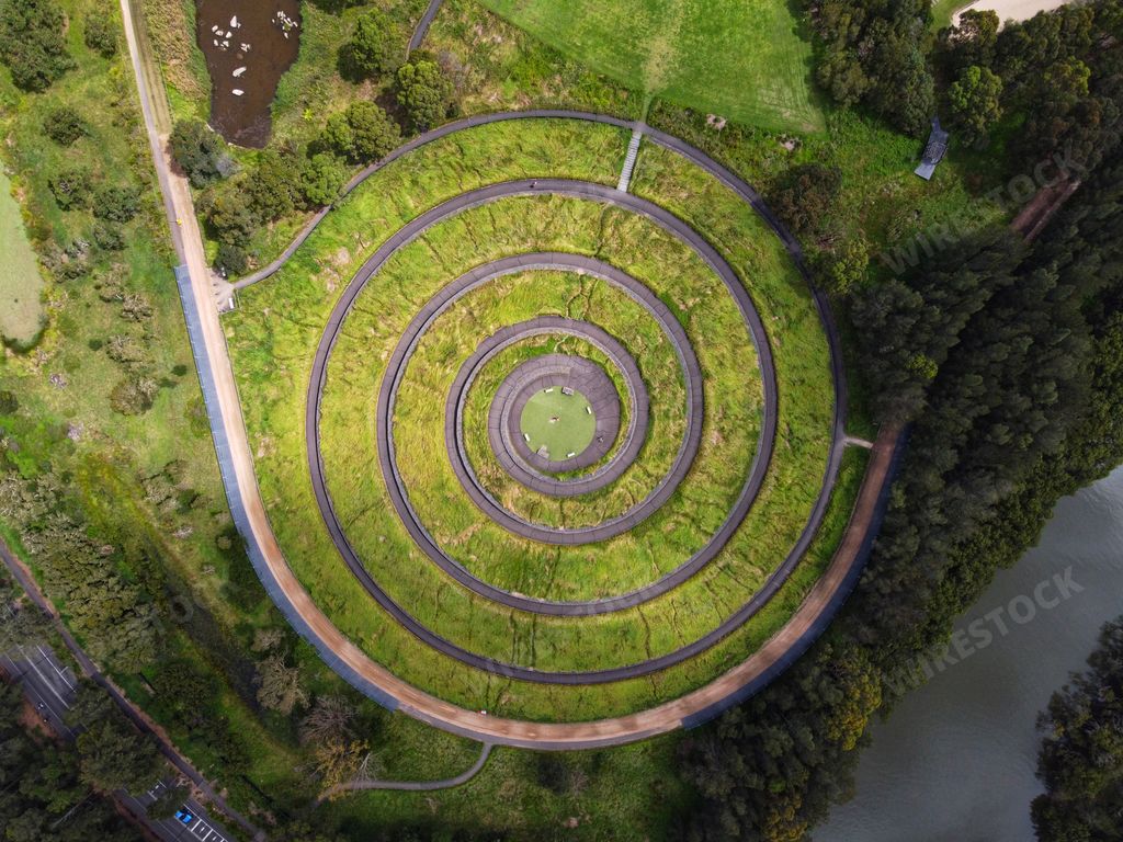 An aerial shot of a Spiral Hilltop green Olympic park