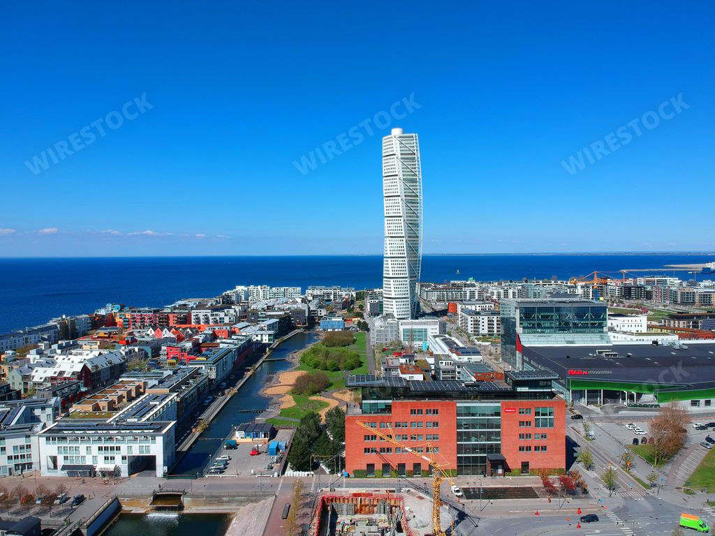 The Turning Torso residential skyscraper in Malmo Sweden with a waterscape during daytime