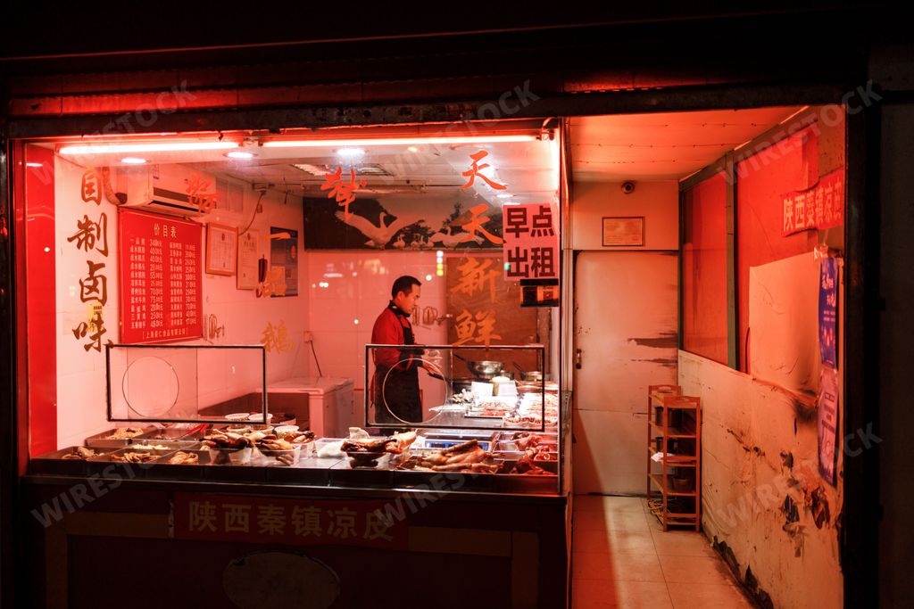 A place to eat in the evening covered with red lights in Shanghai, China