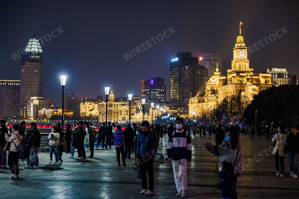A night view of crowded street in Bund in Shanghai, China