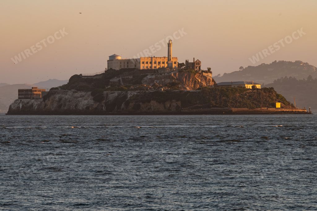 A scenic image of Alcatraz Prison in San Francisco during a beautiful sunrise