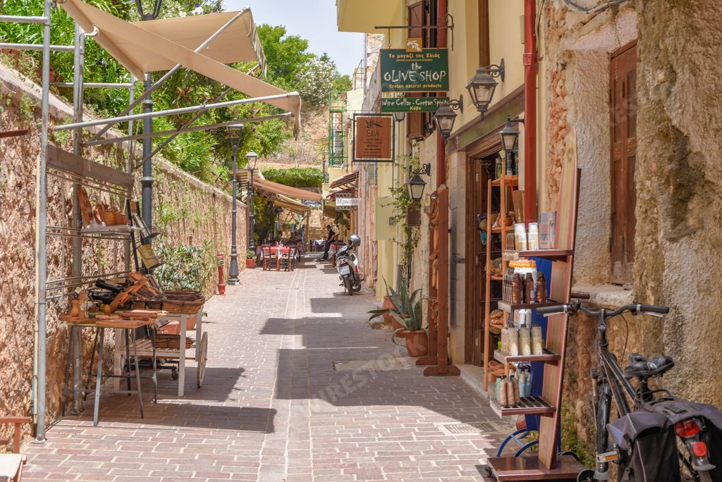 The shops and cafes on the cozy narrow streets of Chania in Crete, Greece